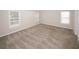 Spacious bedroom with windows and neutral walls provides ample natural light at 365 Hunt Creek Dr, Acworth, GA 30101