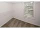 Bright closet featuring carpet flooring, wire shelving, and a window letting in natural light at 365 Hunt Creek Dr, Acworth, GA 30101