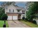 Charming two-story home with a two-car garage and well-maintained lawn at 365 Hunt Creek Dr, Acworth, GA 30101