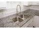 Close-up on stainless steel kitchen sink with granite countertop at 365 Hunt Creek Dr, Acworth, GA 30101