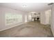 Open concept living space with view into the kitchen, and hardwood floors at 365 Hunt Creek Dr, Acworth, GA 30101