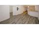 Spacious living room area with a granite bar and beautiful wood floors at 365 Hunt Creek Dr, Acworth, GA 30101
