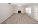 Spacious living room features a fireplace, large windows and carpeted floors at 365 Hunt Creek Dr, Acworth, GA 30101