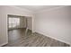 Bright living room with wood-look tile floor and natural light at 365 Hunt Creek Dr, Acworth, GA 30101