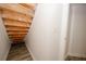 Basement staircase with wood stairs and white walls at 365 Hunt Creek Dr, Acworth, GA 30101