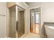 Modern bathroom featuring a glass-enclosed shower and granite countertop vanity at 44 Peachtree Ne Pl # 1824, Atlanta, GA 30309