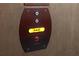 Close-up of the elevator call button with the word 