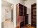 Hallway with built-in storage and view to the bathroom at 44 Peachtree Ne Pl # 1824, Atlanta, GA 30309
