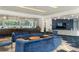Comfortable resident lounge with plush seating, wet bar, modern accents, and large windows at 44 Peachtree Ne Pl # 1824, Atlanta, GA 30309
