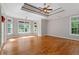 Spacious main bedroom with hardwood floors at 612 Champions Dr, Mcdonough, GA 30253