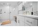 This bathroom features an all-glass shower, modern fixtures, and plenty of counter space at 120 Vanira Se Ave, Atlanta, GA 30315