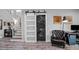 Convenient laundry area with stacked washer/dryer, desk and decorative accents at 120 Vanira Se Ave, Atlanta, GA 30315