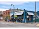 Charming exterior view of Little Tart Bakeshop with a line of people waiting outside at 120 Vanira Se Ave, Atlanta, GA 30315