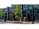 Exterior view of the Press Shop, featuring a brick facade and street-level storefront with large windows at 120 Vanira Se Ave, Atlanta, GA 30315