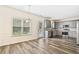 Bright kitchen with eat-in area, features modern appliances and stylish gray cabinetry at 1212 Ashton Park Dr, Lawrenceville, GA 30045