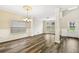 Spacious living room with high ceilings and lots of natural light through large windows at 1212 Ashton Park Dr, Lawrenceville, GA 30045