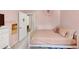 This bedroom features a twin bed and a walk-in closet for ample storage space at 1625 Clark Lake Nw Dr, Acworth, GA 30102