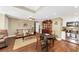 Open-concept living room and kitchen area with hardwood floors at 1625 Clark Lake Nw Dr, Acworth, GA 30102