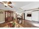 Open-concept living room with hardwood floors and lots of lighting at 1625 Clark Lake Nw Dr, Acworth, GA 30102