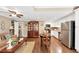 Open concept living room with dining area and stainless steel refrigerator at 1625 Clark Lake Nw Dr, Acworth, GA 30102