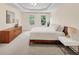This main bedroom has ample space and light from the large windows at 1625 Clark Lake Nw Dr, Acworth, GA 30102