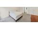 Neutral main bedroom featuring carpet, and access to the en-suite bathroom at 1625 Clark Lake Nw Dr, Acworth, GA 30102