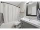 Bathroom with a shower-tub combination, a vanity with a mirror, and a classic, functional design at 3313 Harmon Ridge Ct, Buford, GA 30519