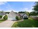 Charming single-story home with a well-manicured lawn and attached two-car garage at 3313 Harmon Ridge Ct, Buford, GA 30519