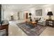 Basement entertainment area with a comfortable seating, stylish decor, and modern lighting at 390 Hembree Rd, Roswell, GA 30075