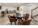 Finished basement game room with poker table, wet bar, and access to the staircase at 390 Hembree Rd, Roswell, GA 30075