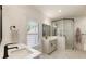Modern bathroom with double sinks, white subway tile in the shower, and modern fixtures, offering a spa-like experience at 390 Hembree Rd, Roswell, GA 30075