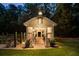 Exterior of greenhouse with open doors surrounded by landscaping at 390 Hembree Rd, Roswell, GA 30075