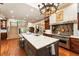 Gourmet kitchen with large island, white subway tile backsplash and professional-grade appliances at 390 Hembree Rd, Roswell, GA 30075