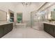 Bright bathroom featuring double vanity, freestanding tub, and marble shower at 390 Hembree Rd, Roswell, GA 30075