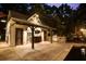 Outdoor pool house featuring a bar, grill, and seating area at 390 Hembree Rd, Roswell, GA 30075