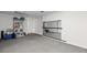 Spacious basement with ample storage, mirrored wall and gray carpet at 125 Winter Valley Ct, Fayetteville, GA 30215