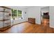 Sunlit flex room featuring hardwood floors and neutral paint palette at 125 Winter Valley Ct, Fayetteville, GA 30215