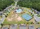 Enjoy this bird's eye view of the community pool, tennis courts, playground, and clubhouse amenities at 178 Crestbrook Way, Dallas, GA 30157