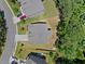 Aerial view of the house showing the roof and the surrounding landscape and neighborhood at 178 Crestbrook Way, Dallas, GA 30157