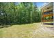 Expansive backyard with a covered porch, perfect for outdoor gatherings and enjoying nature at 178 Crestbrook Way, Dallas, GA 30157