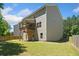 Backyard with raised deck of a home with neutral colored siding at 178 Crestbrook Way, Dallas, GA 30157