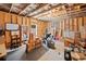Unfinished basement, with exposed beams and room for a workshop or storage at 178 Crestbrook Way, Dallas, GA 30157