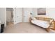 Bedroom featuring carpeted floor, daybed, and open doorway to an adjoining bathroom at 178 Crestbrook Way, Dallas, GA 30157