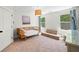 Bedroom filled with natural light, featuring carpet, a unique daybed, and modern furnishings at 178 Crestbrook Way, Dallas, GA 30157
