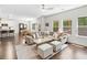 Comfortable living room with hardwood floors and lots of natural light at 178 Crestbrook Way, Dallas, GA 30157