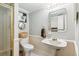 Charming bathroom with tiled shower and pedestal sink at 2610 Ginger Dr, Buford, GA 30519