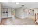 Upstairs bonus room with built-in shelving and drawers and carpet floor at 2610 Ginger Dr, Buford, GA 30519