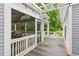 Exterior view of a screened in porch with deck and stairway at 2610 Ginger Dr, Buford, GA 30519