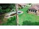 Aerial view showcases an in-ground pool and the spacious backyard at 3257 Georgian Woods Cir, Decatur, GA 30034
