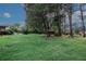Expansive backyard with mature trees, offering a peaceful and private outdoor retreat at 3257 Georgian Woods Cir, Decatur, GA 30034